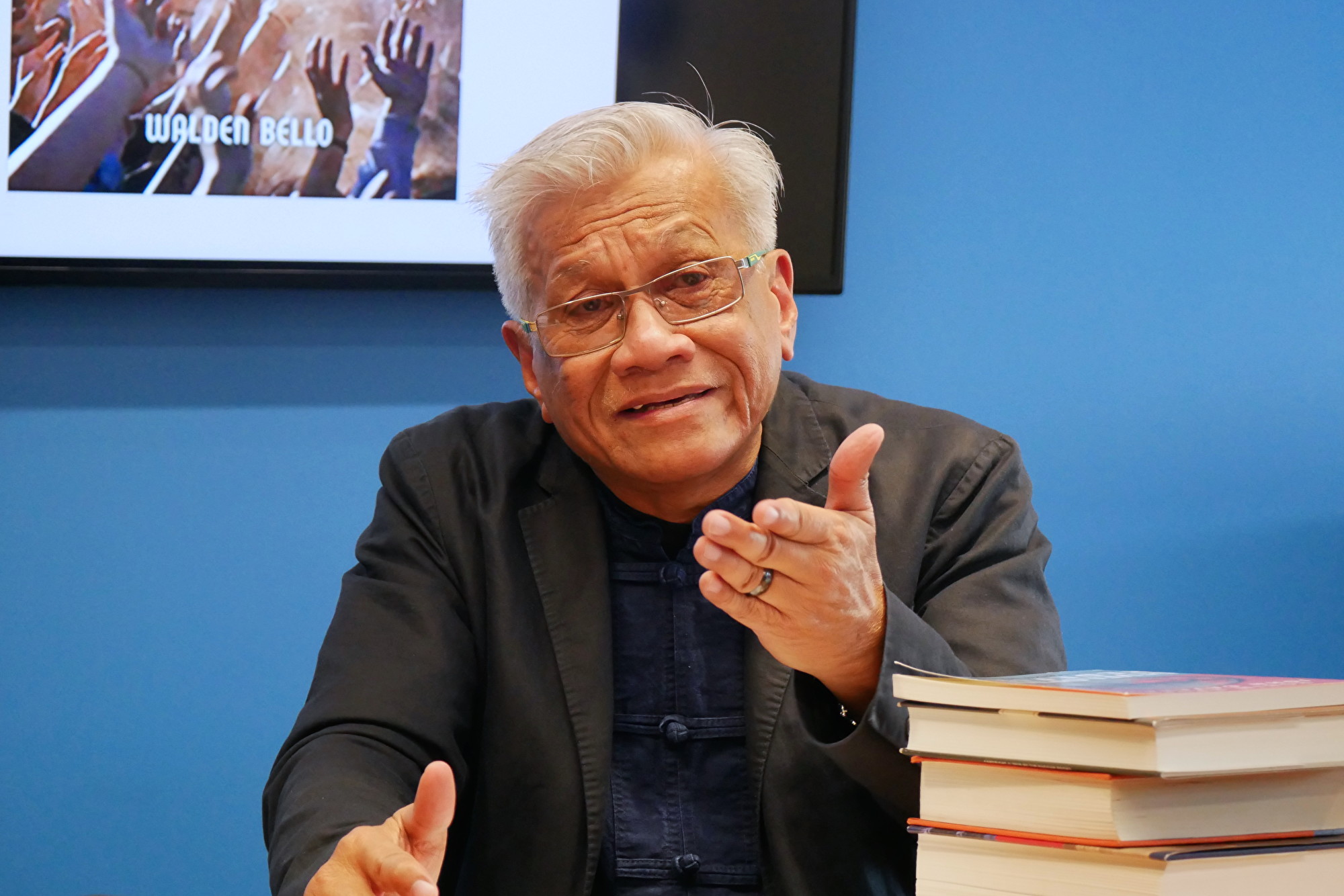 Walden Bello with his books